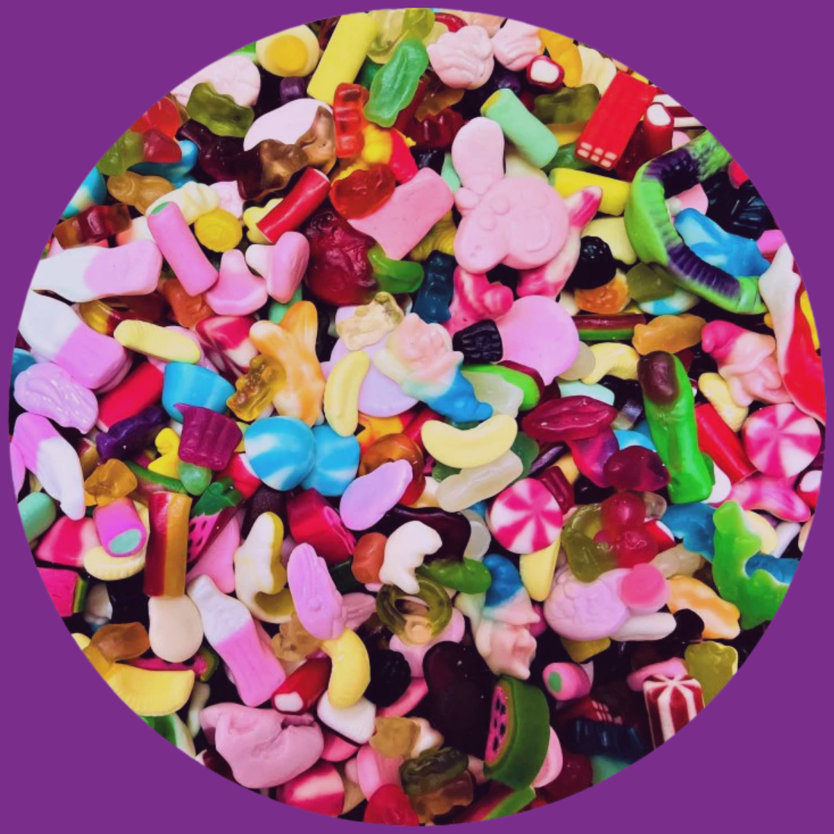 Glossy, sugar-coated shiny gummy sweets including gummy bears in a pick and mix display
